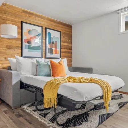 Vibrant basement suite, blending style and comfort for a delightful stay.