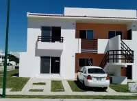 It is a nice , comfortable in private and secure subdivision, near beaches .