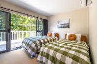 All day sun house with metres away from the golden sands of Onetangi Beach.