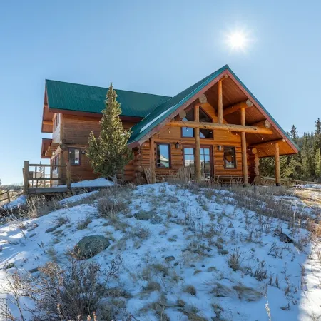 Stunning cabin on 4 acres of land near Breck, mountain views and on-site creek