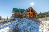 Stunning cabin on 4 acres of land near Breck, mountain views and on-site creek