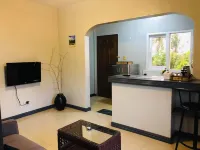 Studio apartment with pool and ocean views .