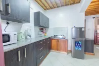 Chic 1-bedroom apartment with WiFi, AC, swimming pool in tranquil Diani Beach