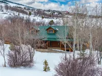 Majestic lake views on 20 private acres with hot tub