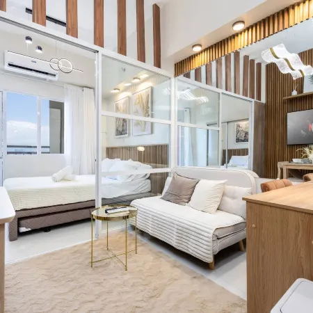 Elegant Wood-Accent Studio with Balcony