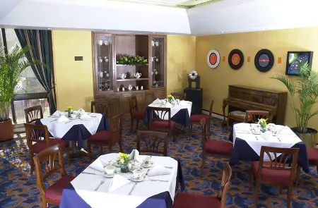 NH Collection Bogotá WTC Royal Отели рядом с достопримечательностью «Carrera 7»