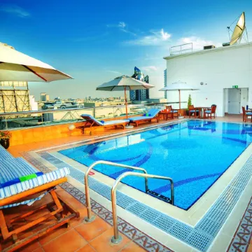 Raviz Center Point Hotel Отели рядом с достопримечательностью «Аль-Карама»