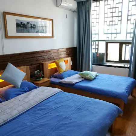 Yuexing Tianxia Chinese Inn (Jishan Street)