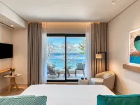 Vathi Cove Luxury Resort & Spa Hotels near شاطئ ماربل