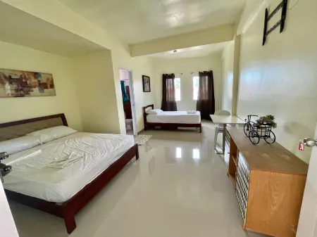 Midpoint Suites Отели в г. Билиран