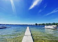 Experience Lake Life at Our 3-Bedroom Beachfront Cottage, Near Grand Rapids.