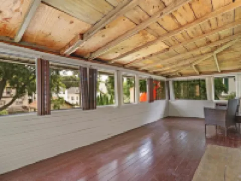 Historic house on tree lined red brick street of historic homes. Hotels in Racine