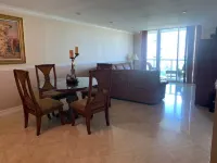 Entire condominium with a pool view, steps from the beach