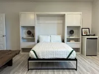 Enjoy sunset and an evening around firepit, short walk to beach and pool