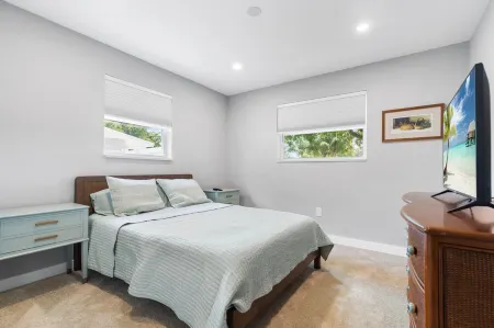 Modern Coastal Home with brand NEW HEATED private saltwater pool!!!