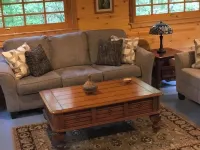 Cozy Cabin in Secluded Forest with Deck on Creek. Full Kitchen. 900 Square Feet.