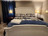 Cabin in Oscoda with hot tub and game room