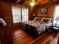 Riverfront Log Cabin with Hot Tub-Tubing on the River, Pet Friendly.