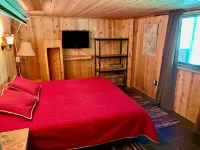 Beautiful Log Cabin 11ac. 4 br. 2.5 ba. on snowmobile trails in Manistee forest.