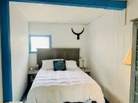 Charming beach cottage in a beautiful garden setting.