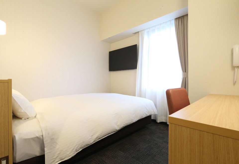 AB Hotel Anjo의 깔끔한 객실 인테리어