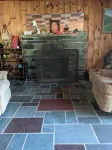 Direct lakefront cottage with wood burning fireplace in great room. Pet friendly