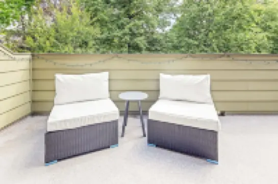 Two Balconies and Seasonal Community Pool - Bright and Airy Retreat