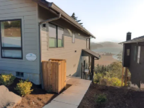 Stunning Bay Views and Cozy Amenities - Modern Coastal Getaway