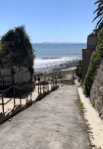 Charming Cottage with Deck and Spacious Yard - Tranquil Beach Retreat