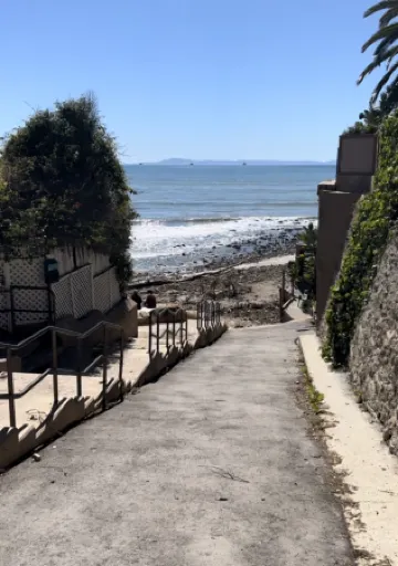 Charming Cottage with Deck and Spacious Yard - Tranquil Beach Retreat