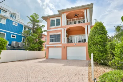 Heated Shared Pool and Covered Patio - Beautiful Coastal Retreat Hotels near Anna Maria Beach