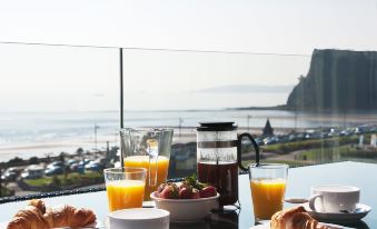 Beachfront Penthouse Apartment with Wrap-Around Balconies and Panoramic Sea Views