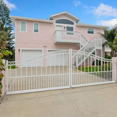 Tropical Elegance Meets Coastal Adventure at This Stunning Oceanfront Retreat!