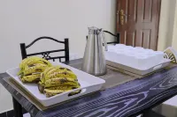 Oltotoi Suites فنادق في Olooloitikosh