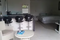 Wainui Absolute Beachfront Studio Unit Hotels in 