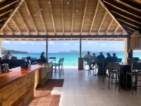 Paradise Awaits! Ground level unit with incredible views, pool, & beach access!