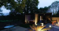 La Douce escapade Loft & Spa : Location loft tout confort moderne avec chambre, jardin minéral, terrasse, spa privatif et parking clos à Sizun dans le Finistère en Bretagne | Séjour et week-end insolite en amoureux Hôtels à : Landivisiau