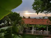 Sky Mountain Café with Seaview Hotels near Rob's beach