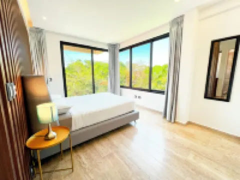 Modern Condo Jungle Retreat Hotels in Puerto Aventuras