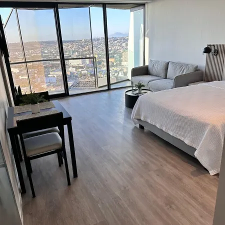 Cozy 1-bedroom condo with WiFi, fitness room in cool Tijuana