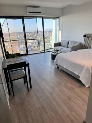 Cozy 1-bedroom condo with WiFi, fitness room in cool Tijuana