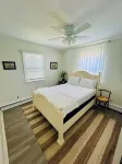 Tranquil 2-bedroom unit, Steps from the beach!