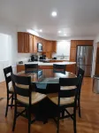 Solar-powered home sleeps 11 near golf courses, hockey & baseball.