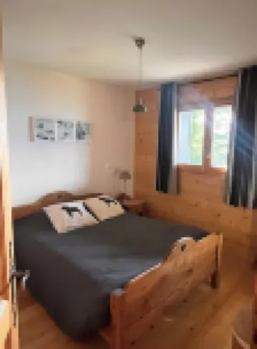 Superb, cozy mountain apartment with shared pool. 維拉爾敍爾多龍酒店