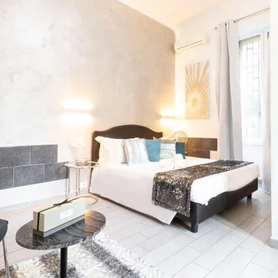 Trastevere Suites - Top Collection Отели рядом с достопримечательностью «Базилика Санта-Приска»