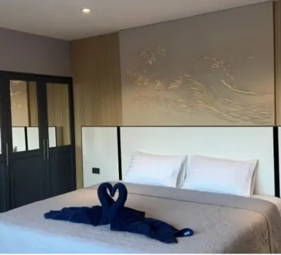 ซูพีเรียห้องพักเตียงคิงไซส์วิวทะเลพร้อมโซฟาเบด