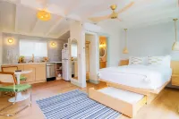 โรงแรมบอร์ดวอล์ค: รวมจักรยาน, บอร์ด และอุปกรณ์ชายหาด - อ่างจากุชชี่