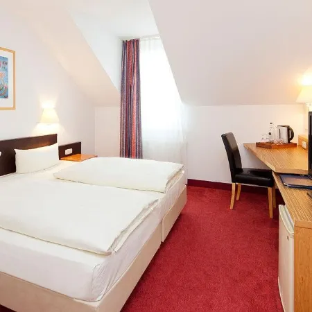 Hotel Garden Cottage Mit Kostenfreien Parkplätzen Отели рядом с достопримечательностью «Институт музыки и ритма Эмиля Жак-Далькроза в городке Хеллерау»
