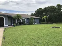 Your own Villa with a Heated Pool near South Florida's wonderful beaches.