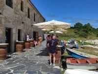 The apartment is located in front of Langosteira beach, with stunning views.